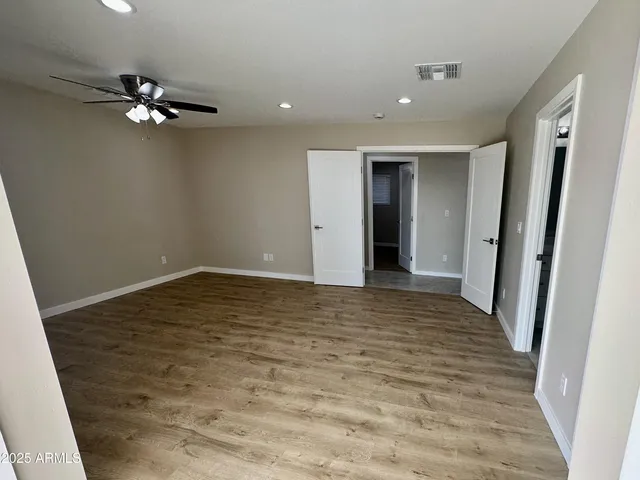 a view of a livingroom with a ceiling fan