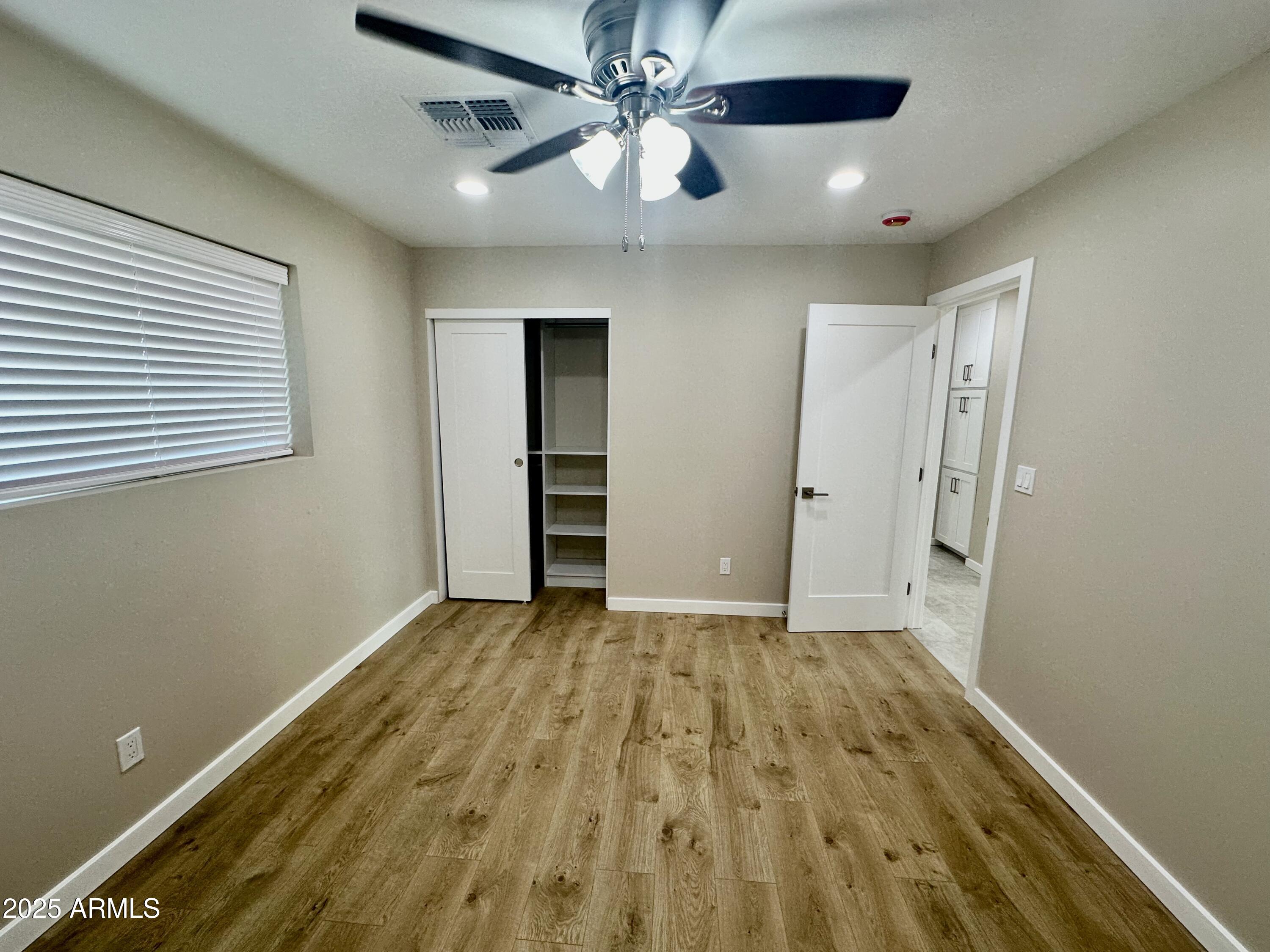 2329 East Enrose Street Mesa, AZ 85213 - Photo 25 of 30 wooden floor in an empty room