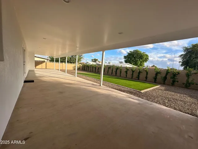 a view of a road with porch