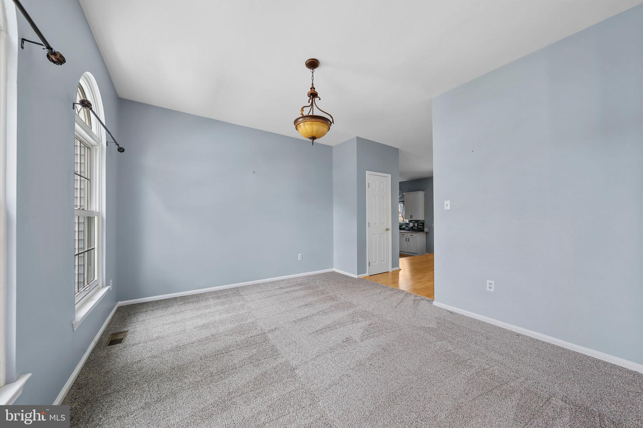 19 Pear Tree Place Sewell, NJ 08080 - Photo 16 of 47 a view of an empty room with wooden floor and windows