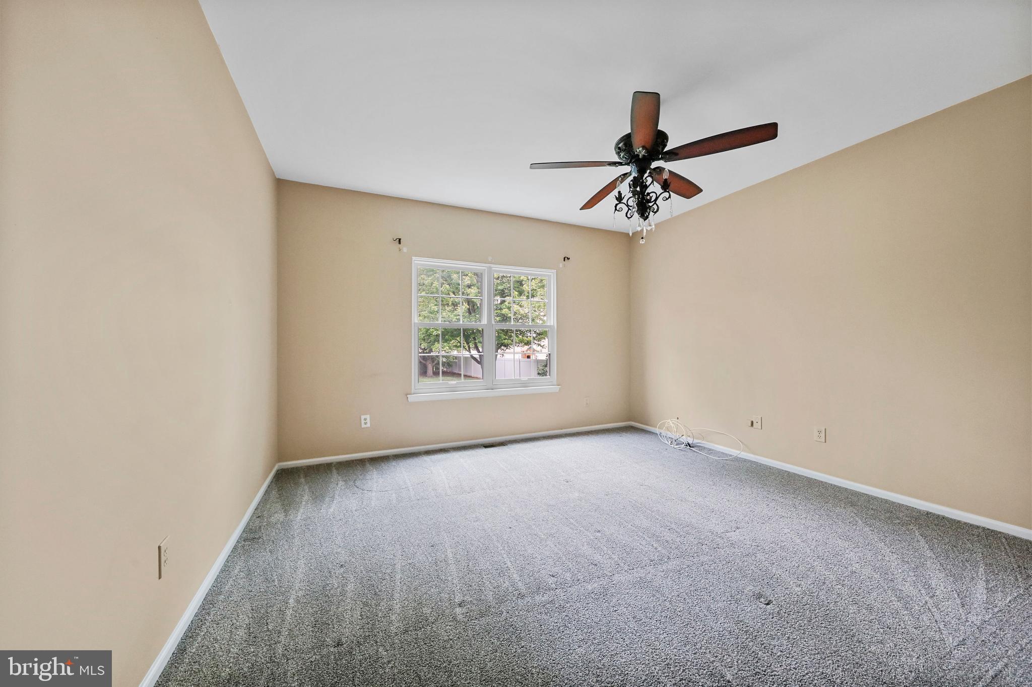 19 Pear Tree Place Sewell, NJ 08080 - Photo 19 of 47 an empty room with windows and fan