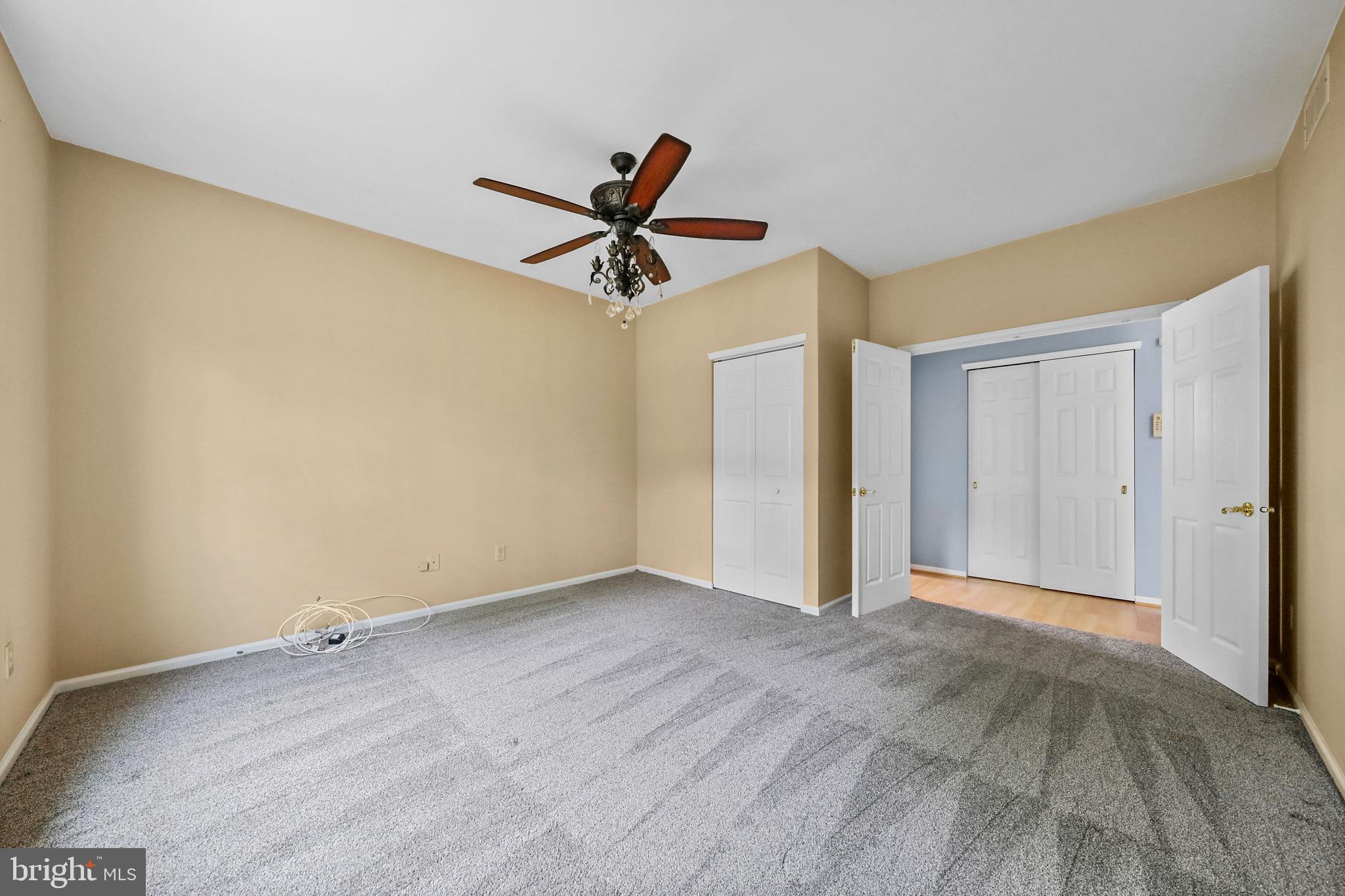 19 Pear Tree Place Sewell, NJ 08080 - Photo 20 of 47 a view of a big room with wooden floor and a ceiling fan