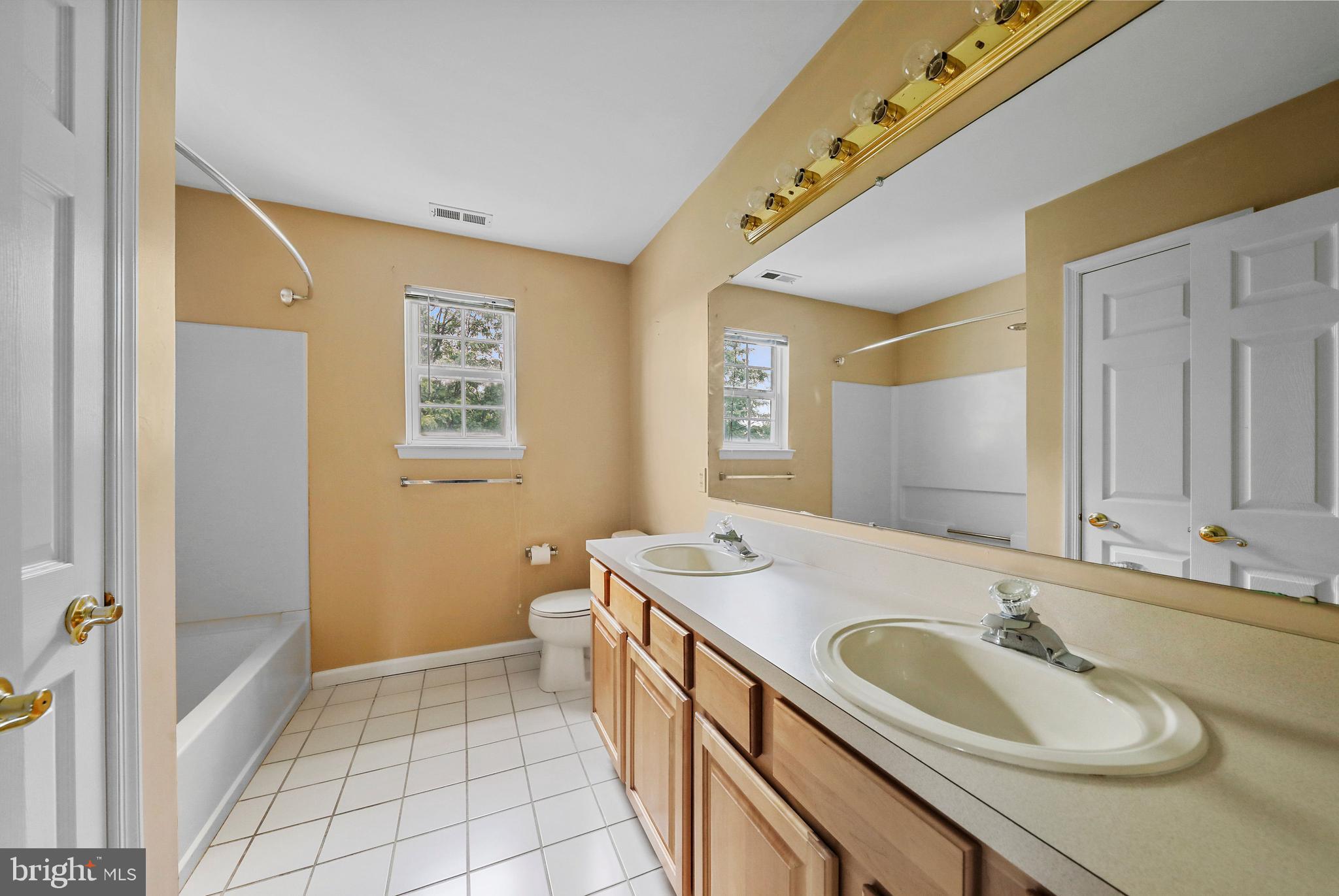 19 Pear Tree Place Sewell, NJ 08080 - Photo 36 of 47 a bathroom with a granite countertop sink and a mirror