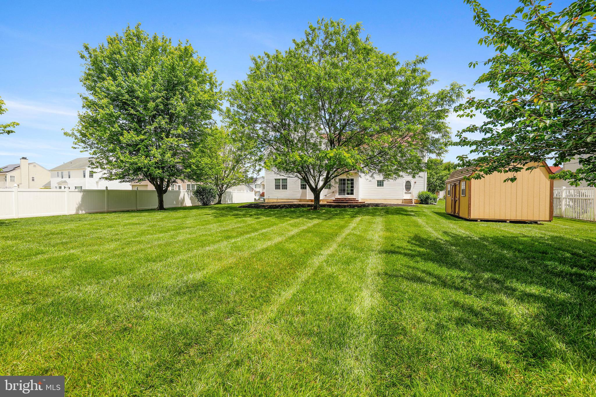19 Pear Tree Place Sewell, NJ 08080 - Photo 45 of 47 a view of a backyard with large trees