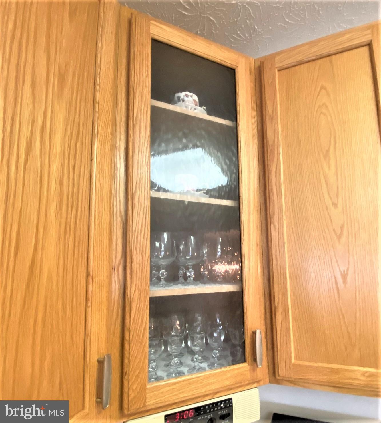 6 Brook Farm Court, Unit E Perry Hall, MD 21128 - Photo 18 of 41 Decorative glass front cabinetry