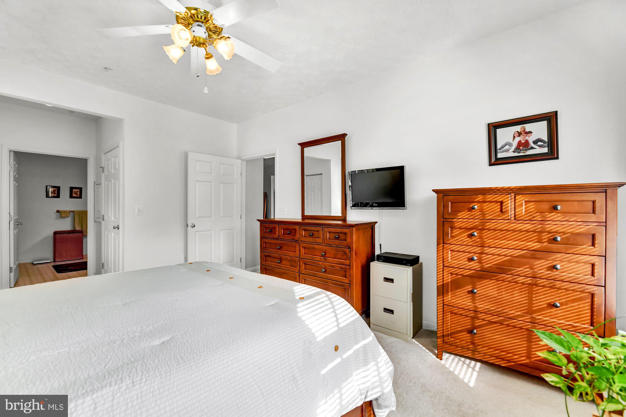 6 Brook Farm Court, Unit E Perry Hall, MD 21128 - Photo 23 of 41 Primary bedroom with full bath.