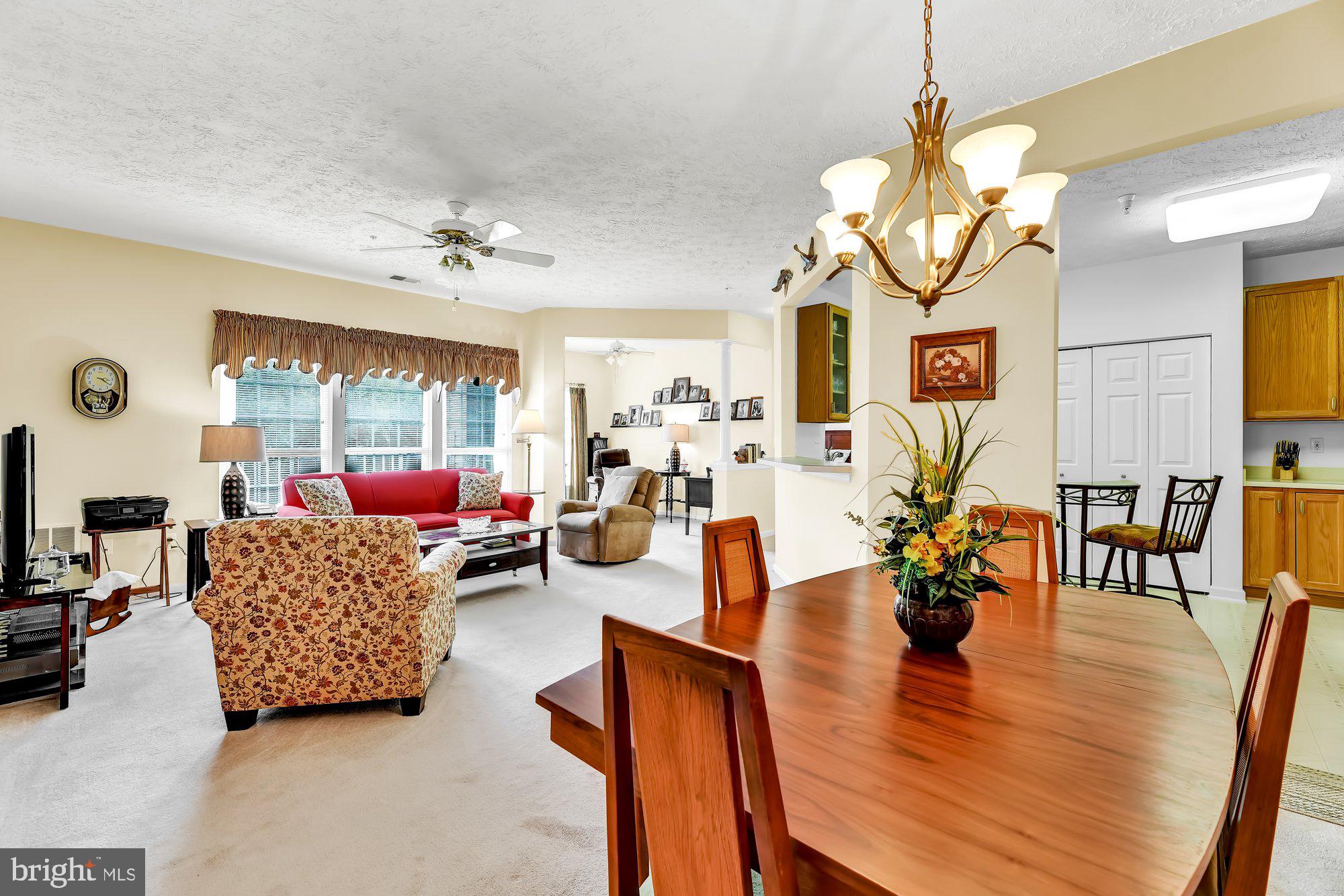 6 Brook Farm Court, Unit E Perry Hall, MD 21128 - Photo 5 of 41 Dining area looking into the living room