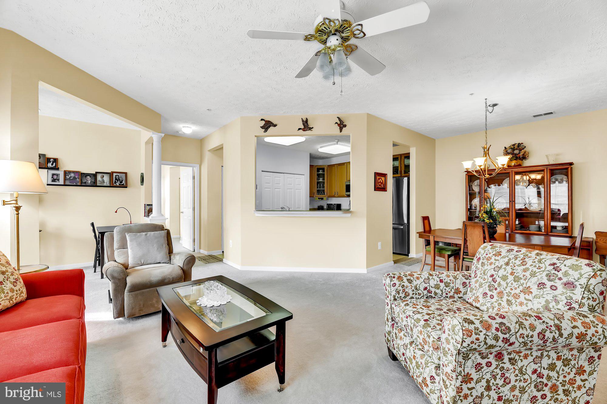 6 Brook Farm Court, Unit E Perry Hall, MD 21128 - Photo 9 of 41 Living Room w/pass through to the kitchen