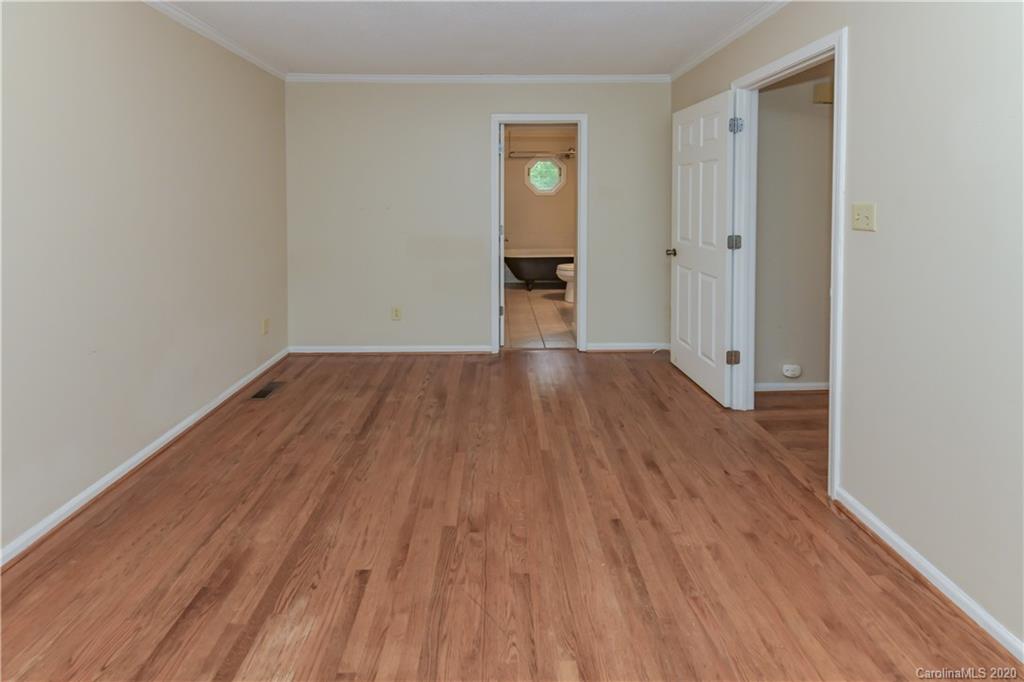 9209 Fairway Ridge Road Charlotte, NC 28277 - Photo 14 of 48 wooden floor in an empty room with a window