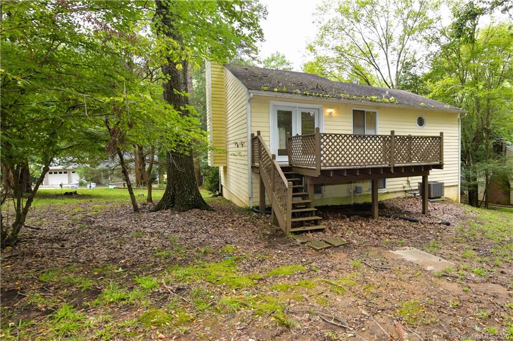 9209 Fairway Ridge Road Charlotte, NC 28277 - Photo 8 of 48 a view of a house with a yard and sitting area