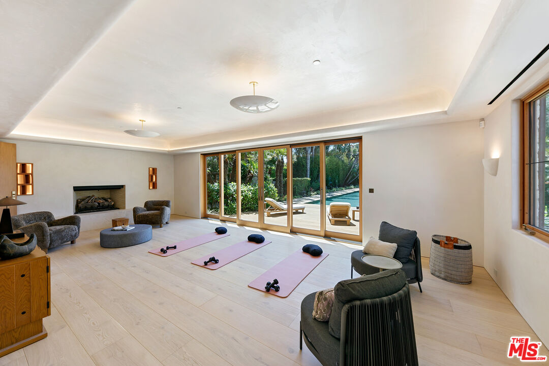 6902 Wildlife Road Malibu, CA 90265 - Photo 31 of 41 a bed room with furniture and a large window