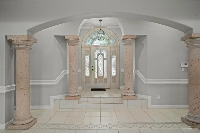 a view of entryway with a front door