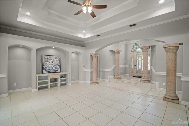 a view of a livingroom with furniture and chandelier