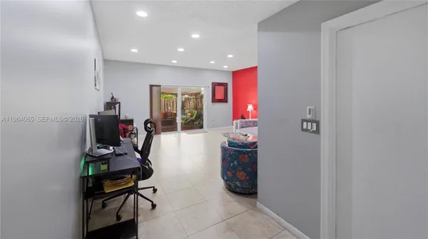 a room with furniture and wooden floor