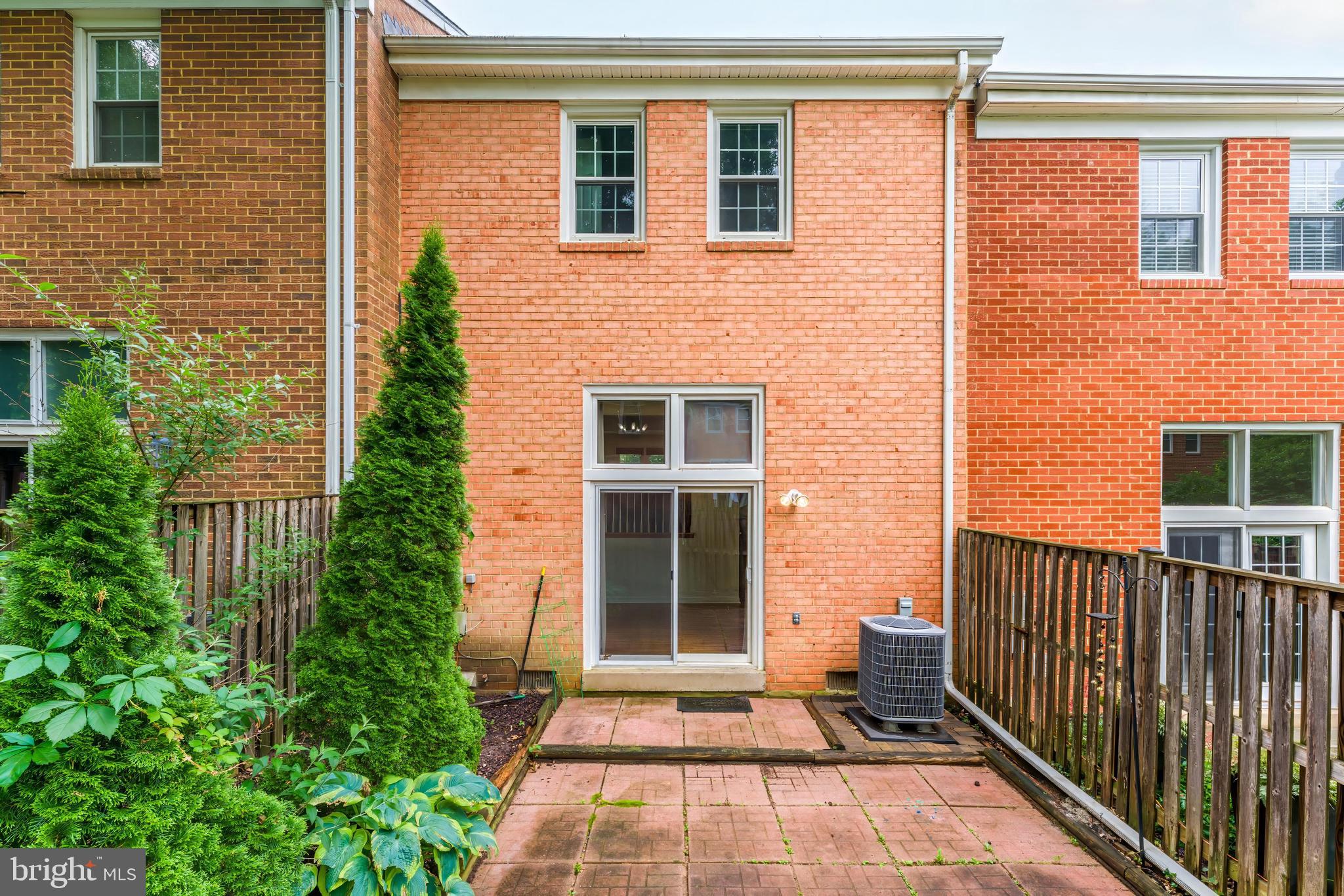 2331 Harleyford Court Reston, VA 20191 - Photo 36 of 40 Charming brick facade with patio retreat.