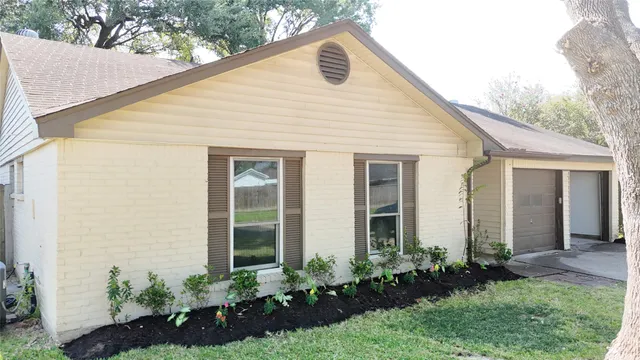 a front view of a house having yard