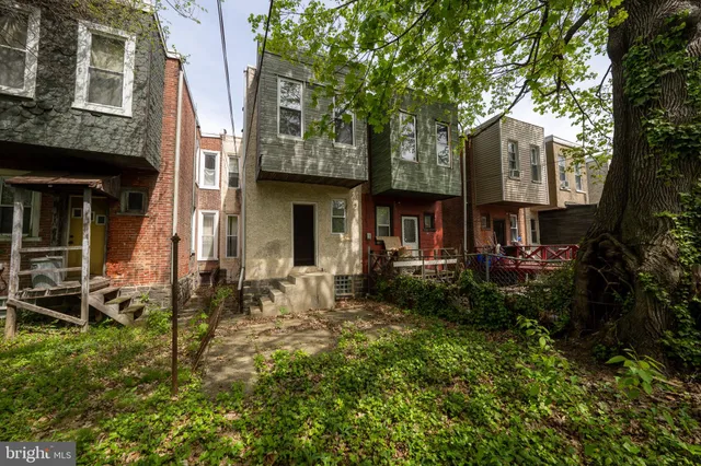 a front view of a house with patio