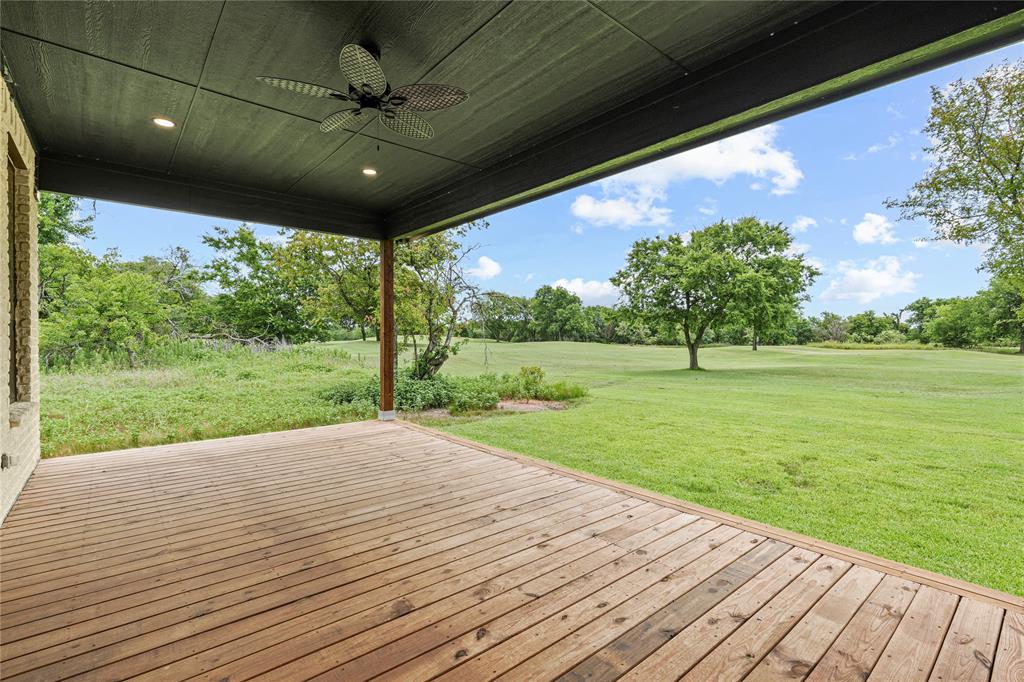 38093 Misty Ridge Drive Whitney, TX 76692 - Photo 14 of 25 a view of a porch with a yard