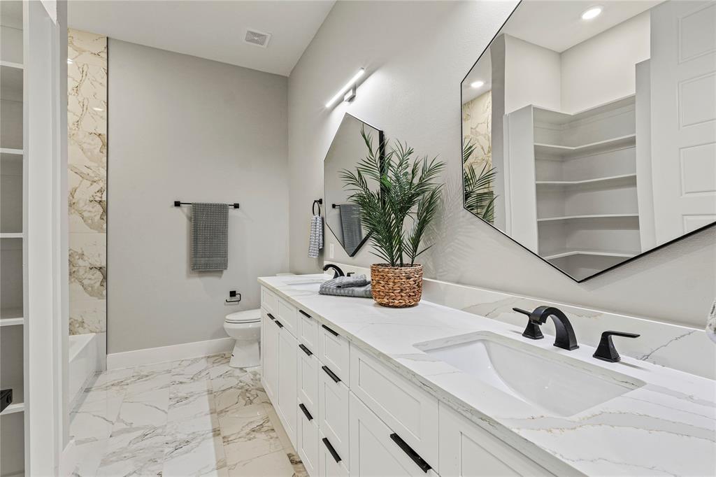 38093 Misty Ridge Drive Whitney, TX 76692 - Photo 24 of 25 a bathroom with a sink and a mirror