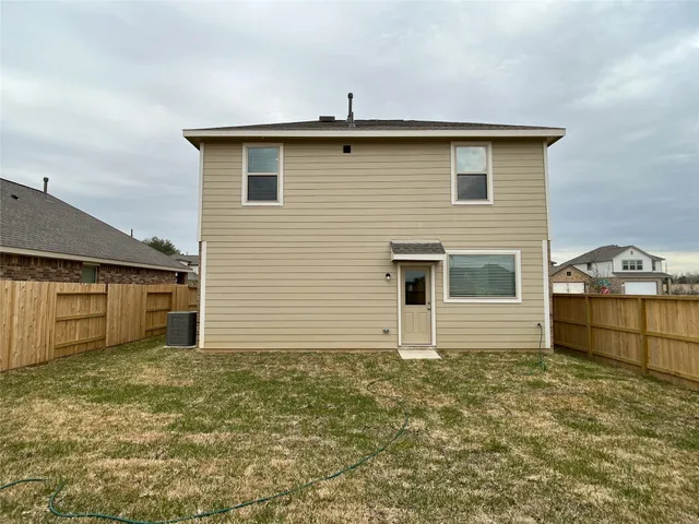 a view of a slide with a bench and wooden floor