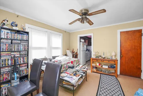 a bedroom with a bed furniture and a window