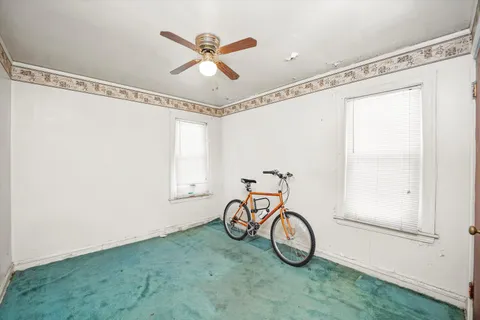 a view of room with gym equipment