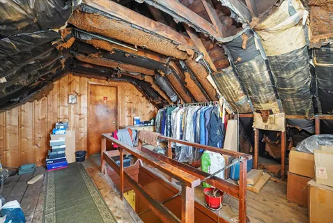 a storage room with washer and dryer