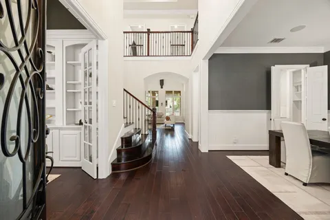 a view of living room with furniture and fireplace
