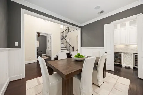 a kitchen with stainless steel appliances granite countertop a stove and cabinets