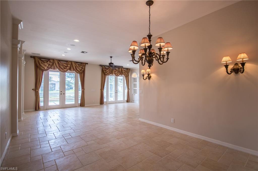 9337 Springview Loop Estero, FL 33928 - Photo 15 of 25 a view of a room with a chandelier