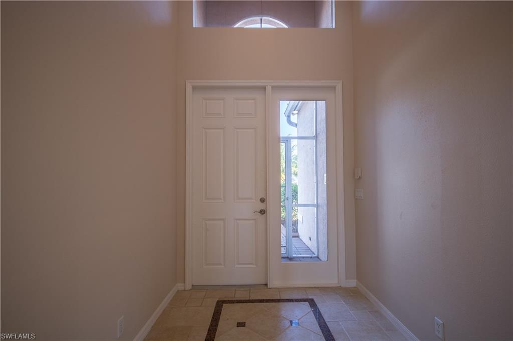 9337 Springview Loop Estero, FL 33928 - Photo 3 of 25 an empty room with windows