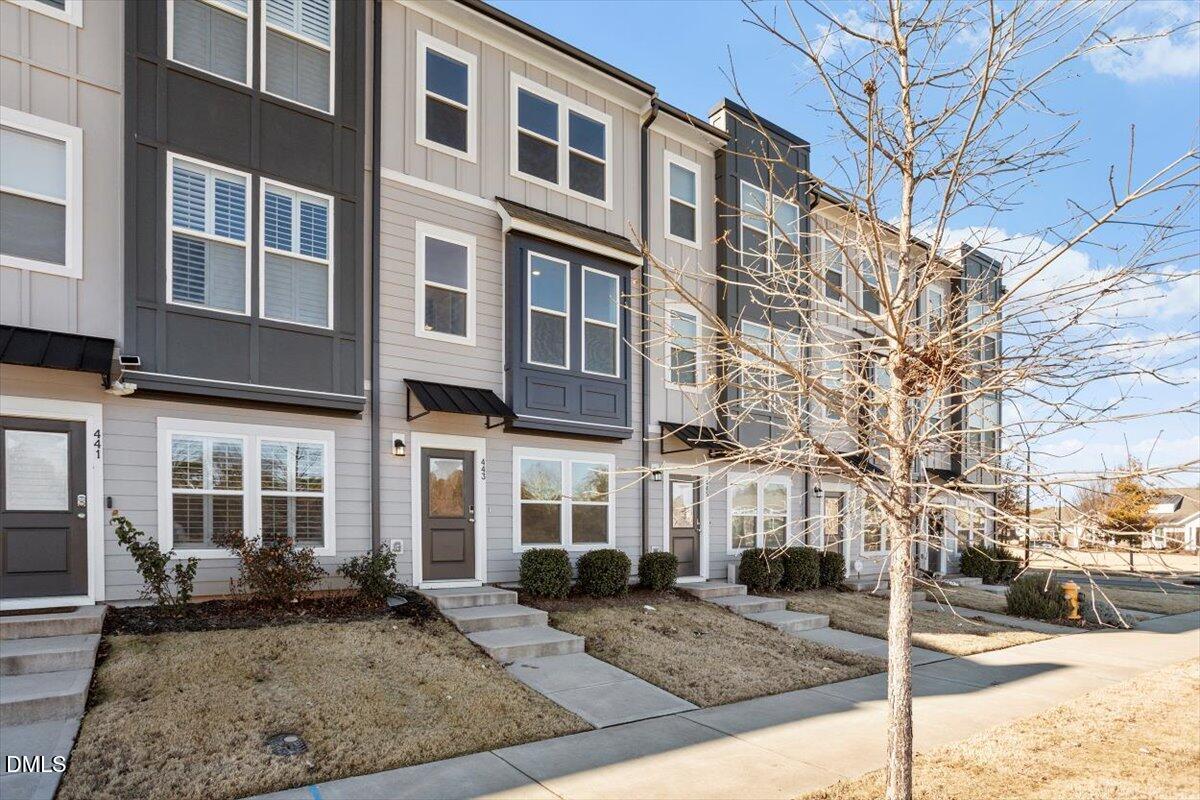 443 North Fisher Street Raleigh, NC 27610 - Photo 2 of 33 a view of a brick building next to a road