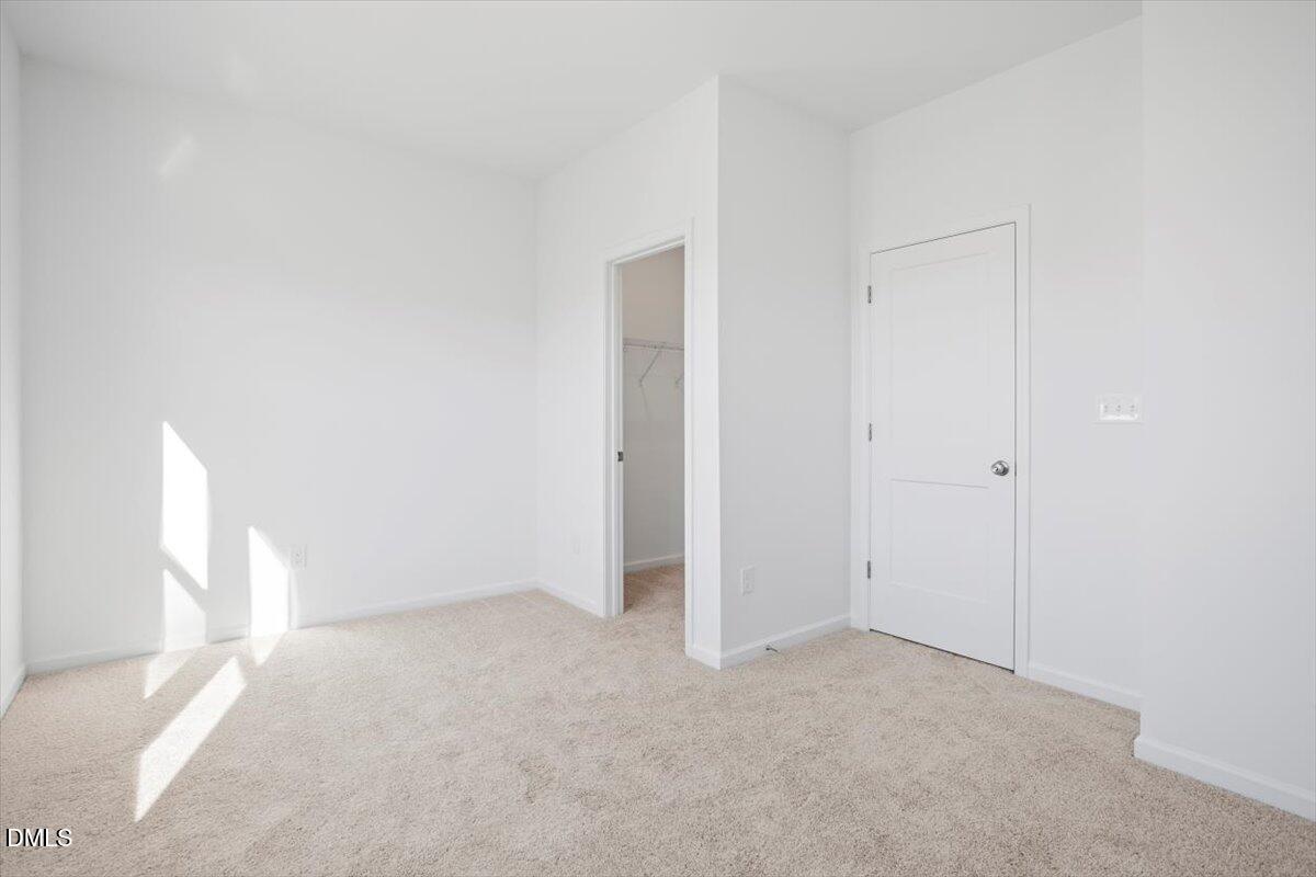 443 North Fisher Street Raleigh, NC 27610 - Photo 25 of 33 a view of an empty room