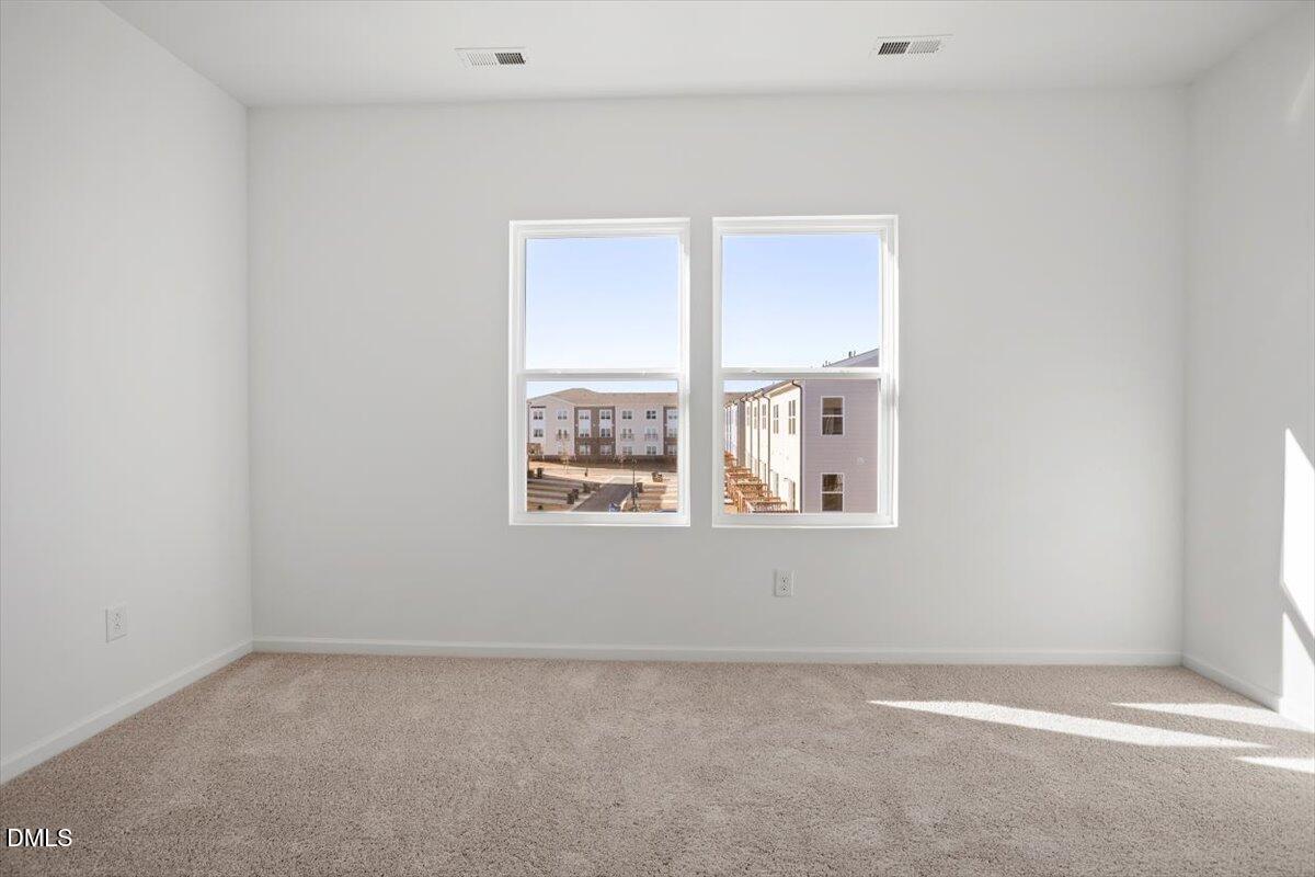 443 North Fisher Street Raleigh, NC 27610 - Photo 26 of 33 a view of an empty room with a window