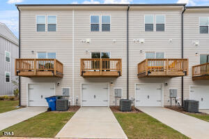 443 North Fisher Street Raleigh, NC 27610 - Photo 30 of 33 a view of a brick house with many windows