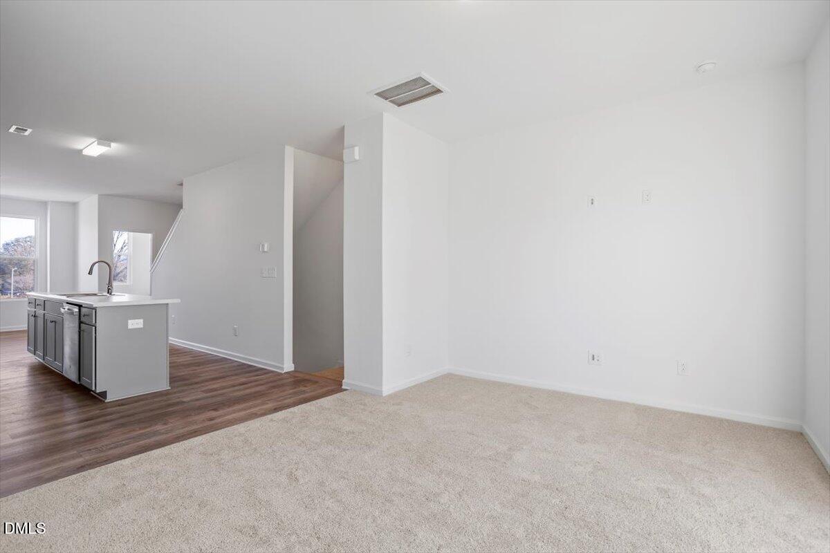 443 North Fisher Street Raleigh, NC 27610 - Photo 10 of 33 a view of a kitchen with a sink