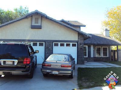 a car parked in front of a house