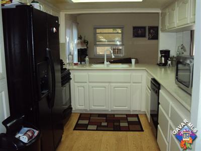 42339 Blossom Drive Lancaster, CA 93536 - Photo 4 of 8 a kitchen with sink and cabinets