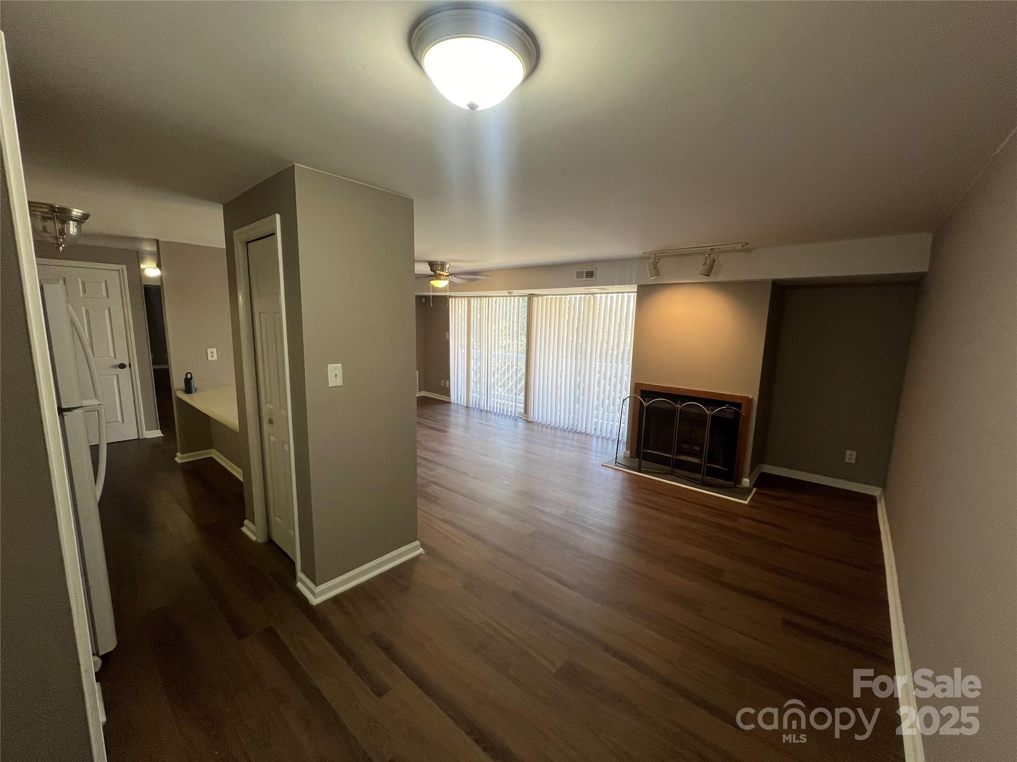 9401 Old Concord Road, Unit K Charlotte, NC 28213 - Photo 11 of 12 a view of a hallway with wooden floor