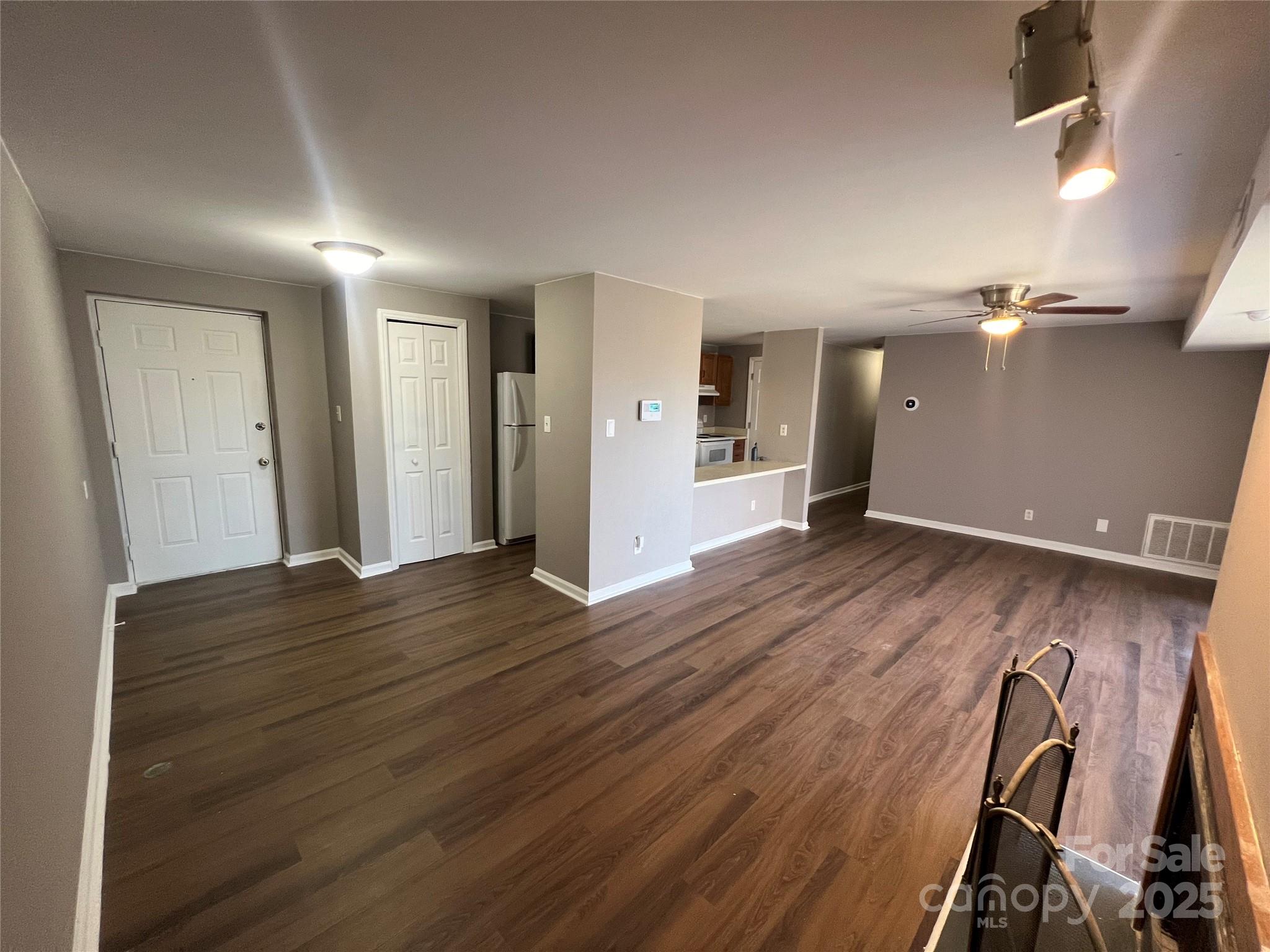 9401 Old Concord Road, Unit K Charlotte, NC 28213 - Photo 4 of 12 a view of a room with wooden floor