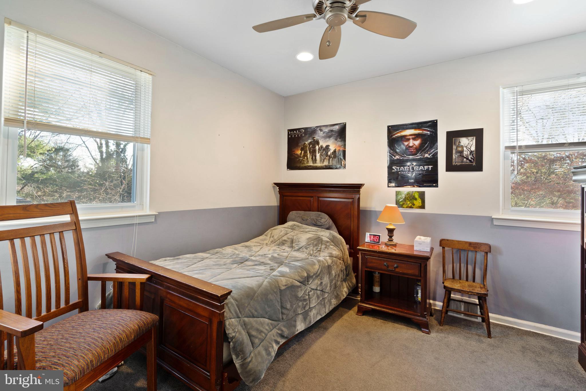 303 Highland Road Cheltenham, PA 19012 - Photo 19 of 25 a bedroom with a bed and a desk