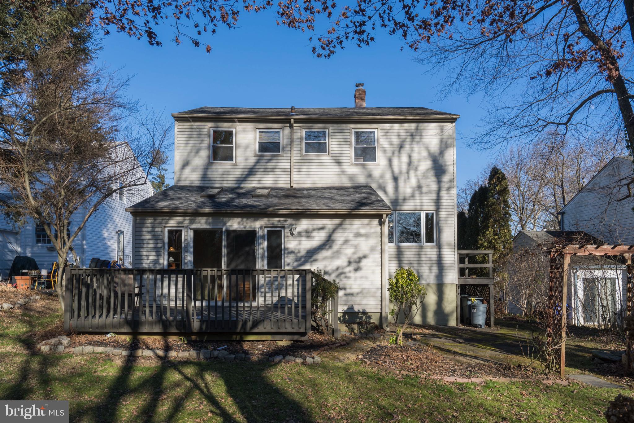 303 Highland Road Cheltenham, PA 19012 - Photo 21 of 25 a front view of a house with a yard