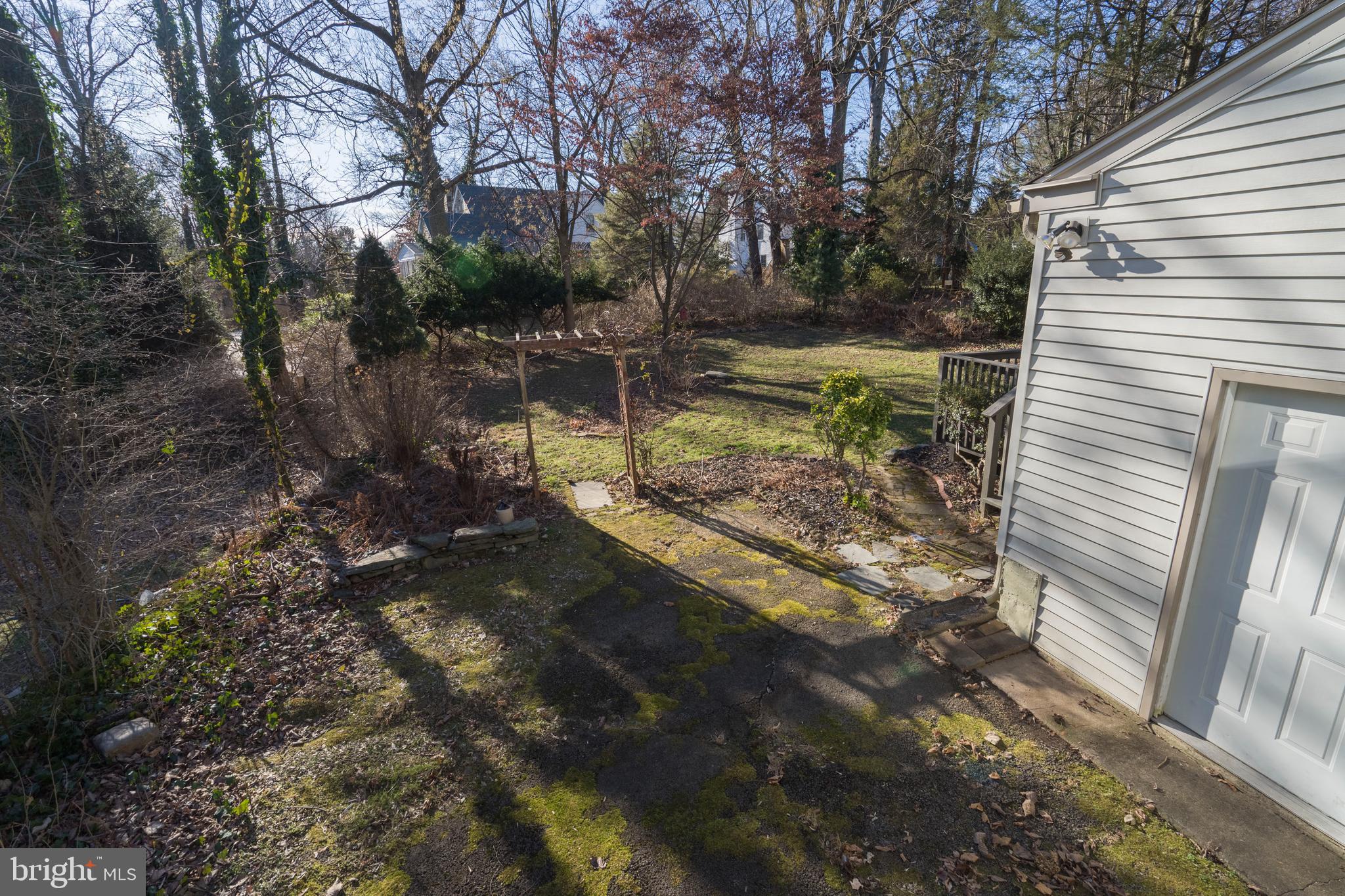 303 Highland Road Cheltenham, PA 19012 - Photo 23 of 25 a view of a back yard of the house