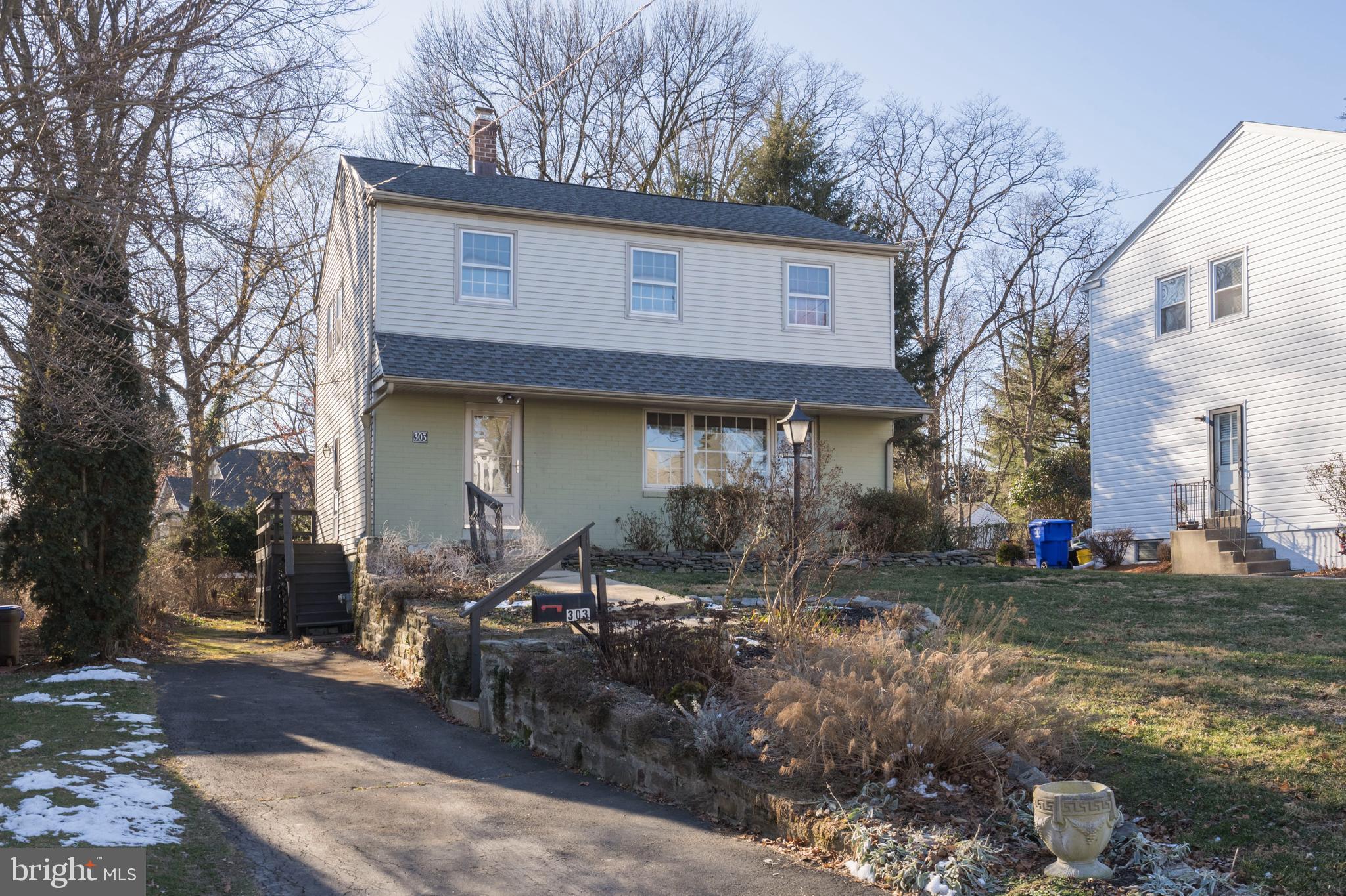 303 Highland Road Cheltenham, PA 19012 - Photo 24 of 25 a view of a house with a yard patio and sitting area