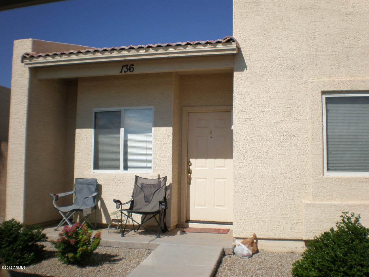 2300 East Magma Road San Tan Valley, AZ 85143 - Photo 1 of 10 a view of a house with a window and sitting area