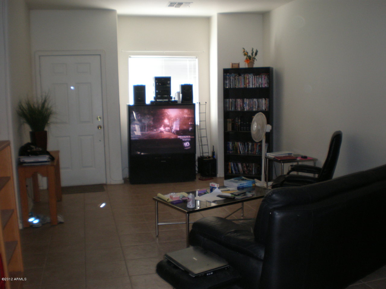 2300 East Magma Road San Tan Valley, AZ 85143 - Photo 3 of 10 a living room with furniture and a flat screen tv