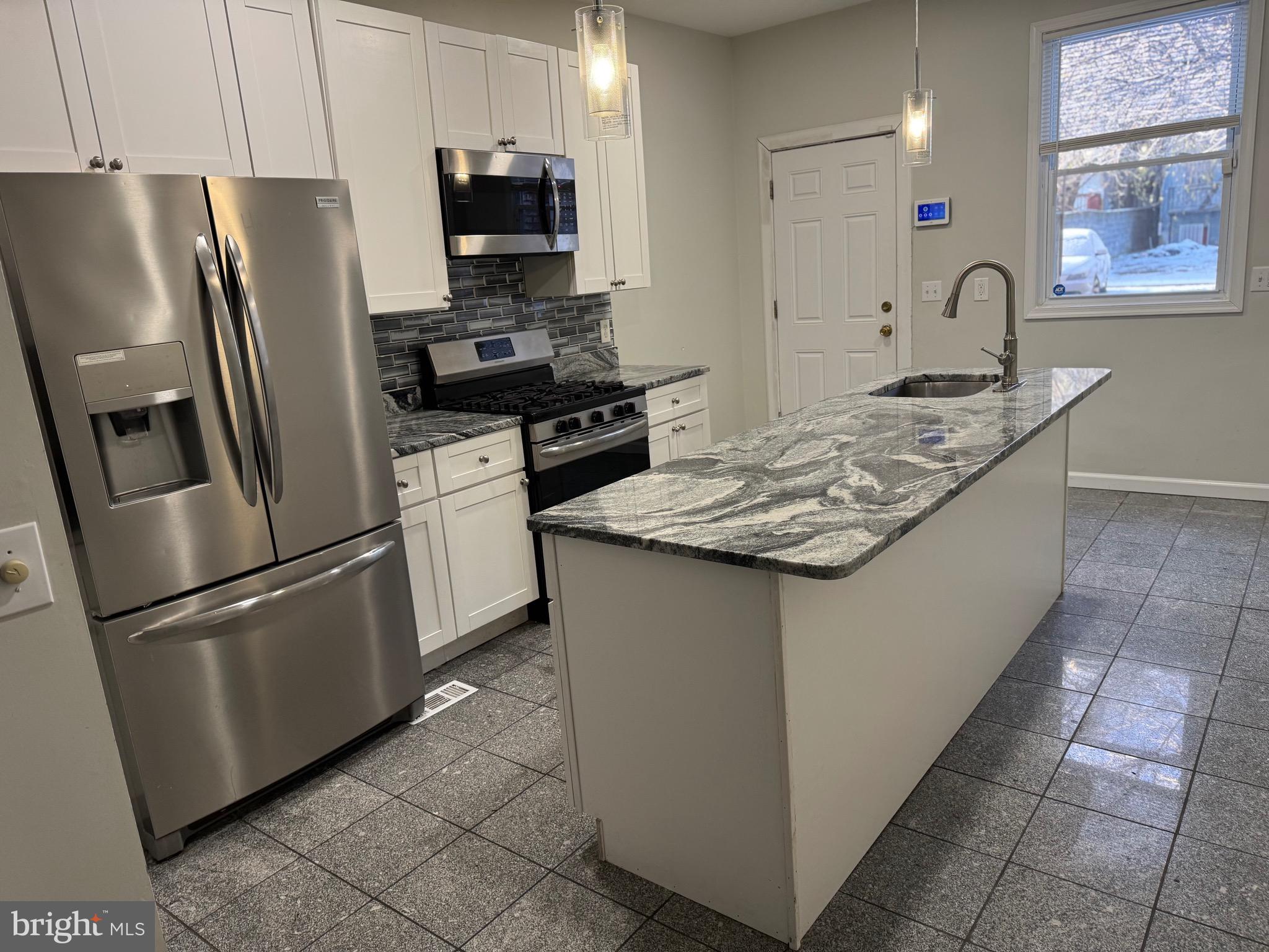 1408 1/2 Madison Avenue Baltimore, MD 21217 - Photo 2 of 57