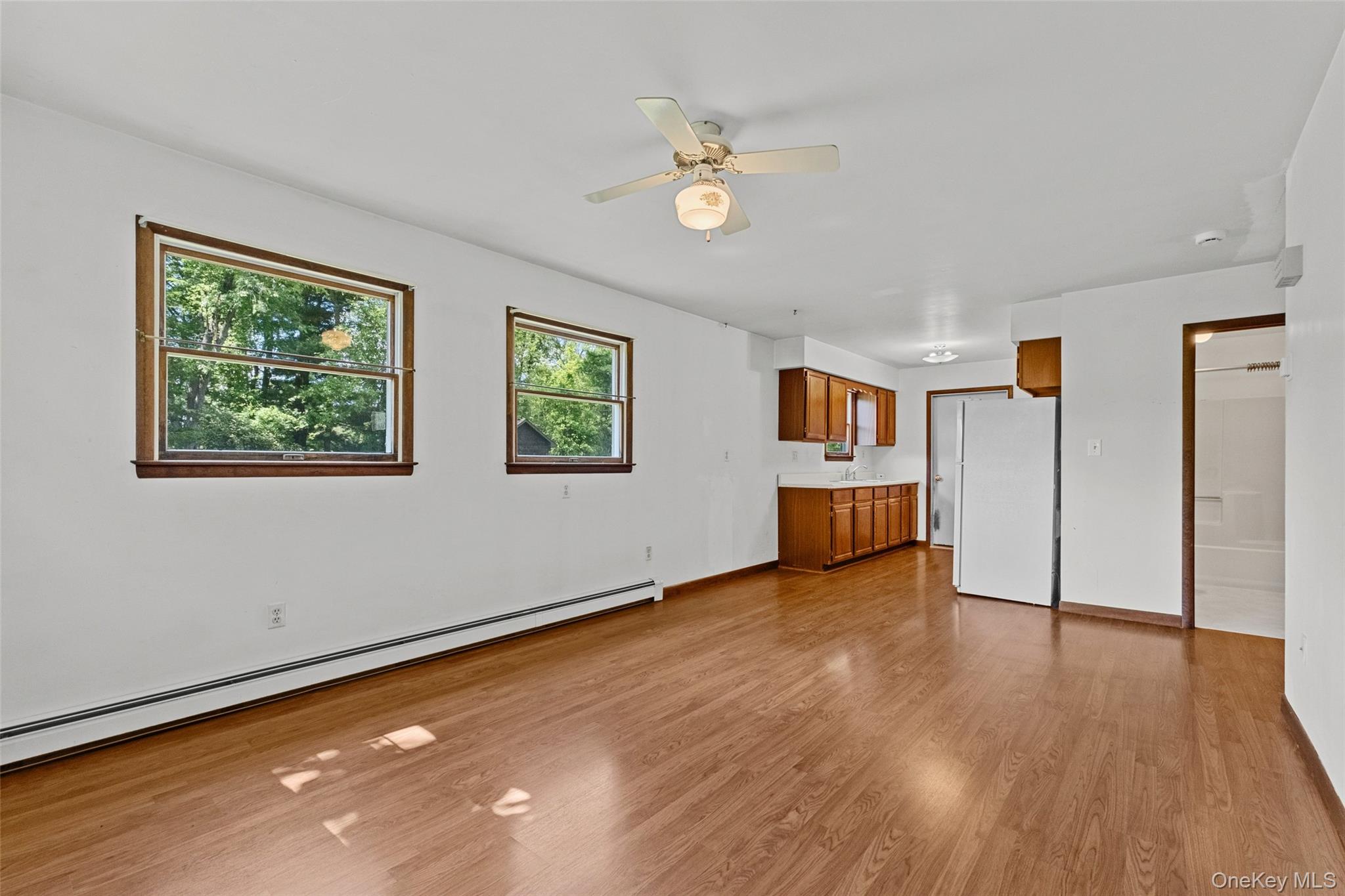 89 Brown Road Wappingers Falls, NY 12590 - Photo 15 of 19 a view of an empty room with window and wooden floor