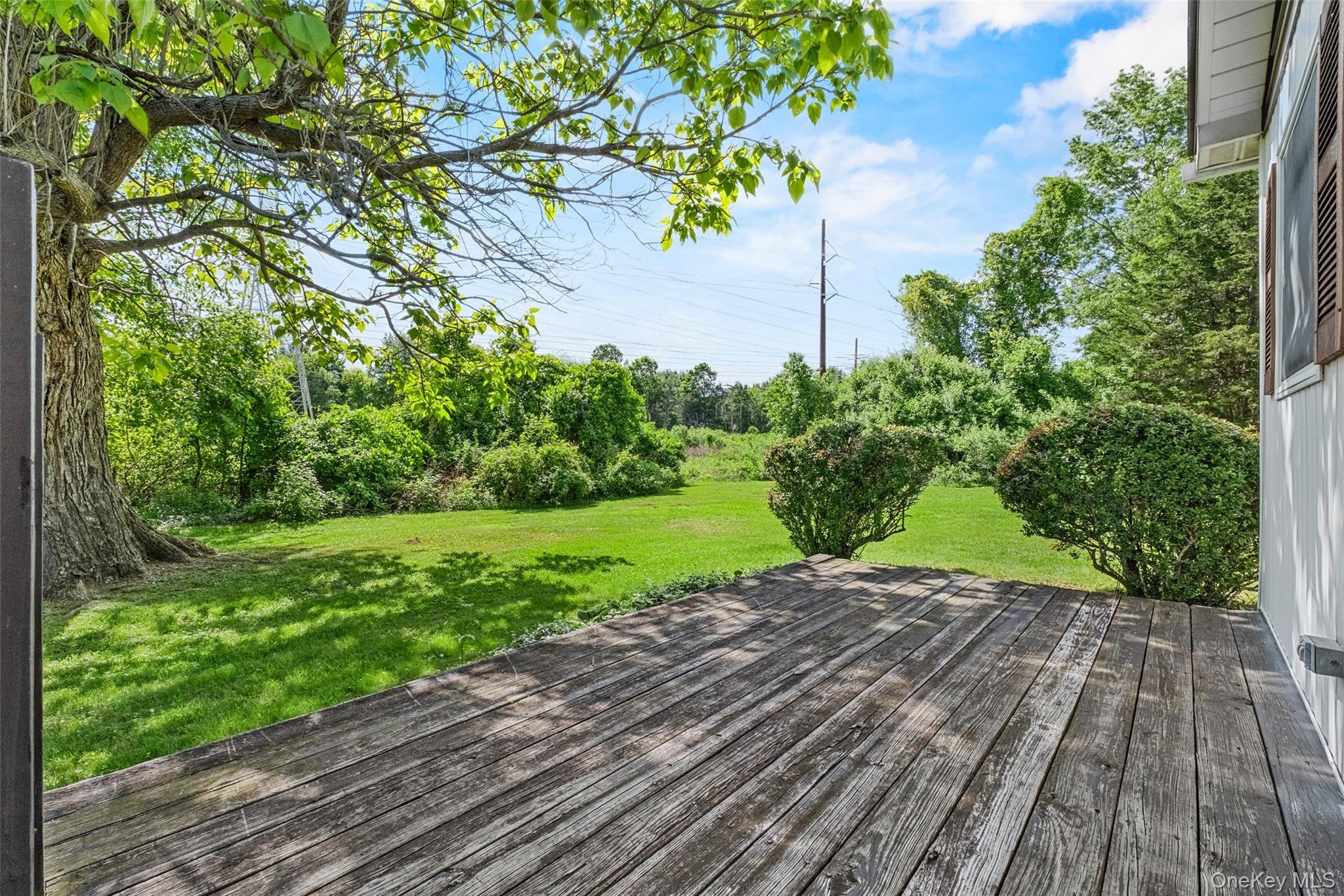 89 Brown Road Wappingers Falls, NY 12590 - Photo 19 of 19 a view of a backyard with wooden floor
