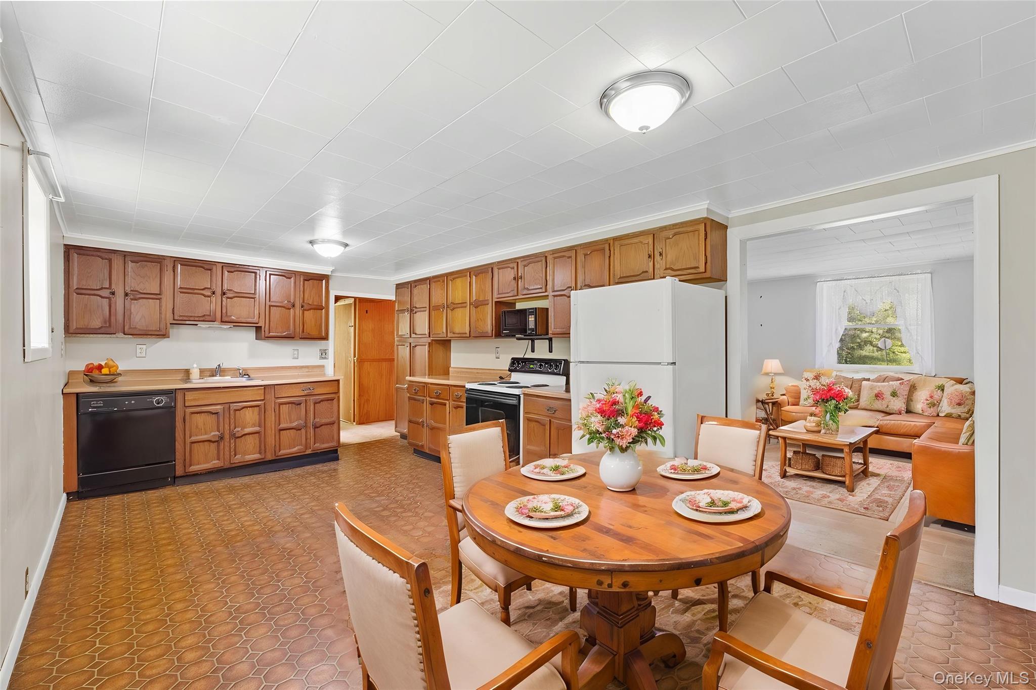 89 Brown Road Wappingers Falls, NY 12590 - Photo 7 of 19 a view of a dining room with furniture and a livingroom